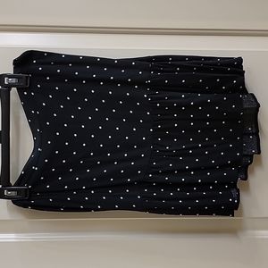 Old Navy LP black & white polka dotted mini skirt with flare.